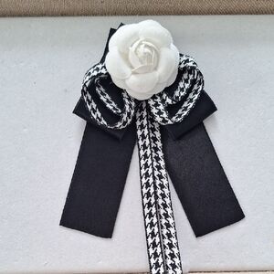 Elegant Black and White Camelia Ribbon Brooch